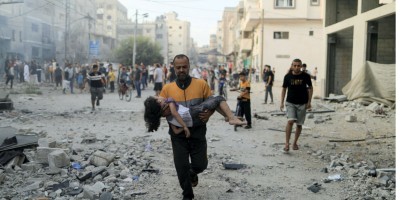 Israel prepares ground assault on Gaza as Palestinians flee
