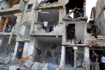 Israel raids Gaza's Al Shifa Hospital, urges Hamas to surrender