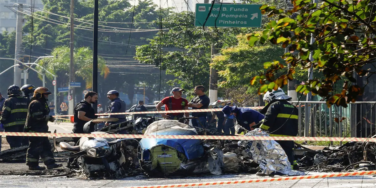 2 dead after small plane crashes on busy Sao Paulo street, hits bus