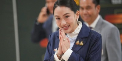 Thai PM overcomes rivals' challenge amid father's alleged influence