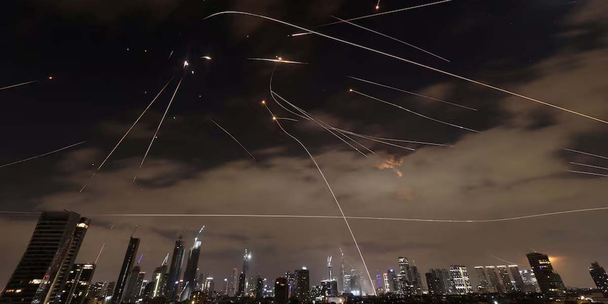 Iranian missiles hit Tel Aviv and Haifa, Israel warns of tough response