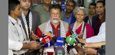 Shahidul Alam returns home after being released from Israeli prison