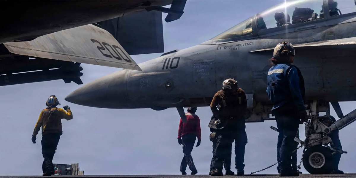 US says it struck Iranian military sites, Tehran responds with air base attack