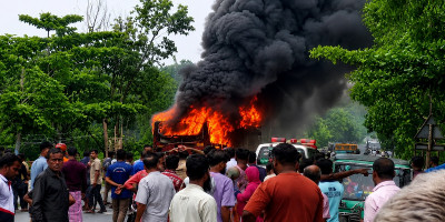 Father, son killed in Fatikchhari road mishap, BRTC bus set on fire