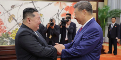 Xi, Kim vow closer China-North Korea ties