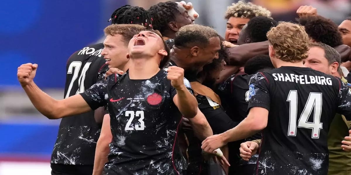 Canada reach World Cup last 16 as late strike sinks South Africa