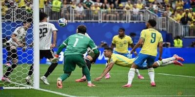 Brazil down Japan 2-1 to reach World Cup last 16