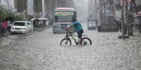 Heavy rain triggers waterlogging across Dhaka