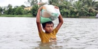 Death toll from floods and onrush of water rises to 54 in 7 districts