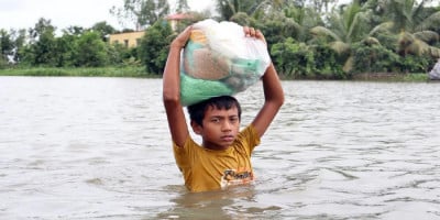 Death toll from floods and onrush of water rises to 54 in 7 districts